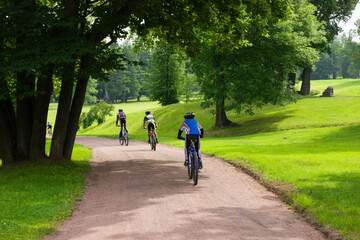 Some bicyclists on the park track