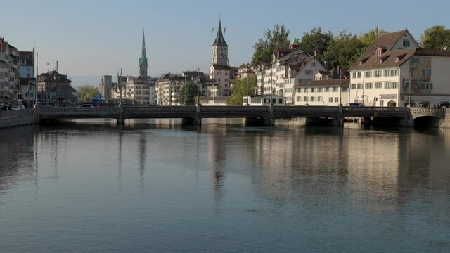 Zurich switzerland: september, 14. 2021 autumn morning, view of the Rudolf brun bridge with swiss heimatwerk buildings in the background sankt peter and fraum&uuml;nster church Close up view
