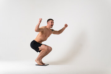 Man with weights health pondered, health and sports on a white background pain sore painful, backache person male young stress, chronic. lumbar ain suffer attractive