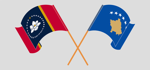 Crossed and waving flags of The State of Mississippi and Kosovo