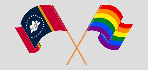 Crossed and waving flags of The State of Mississippi and LGBTQ