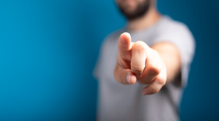 Businessman pointing or touching finger in screen..