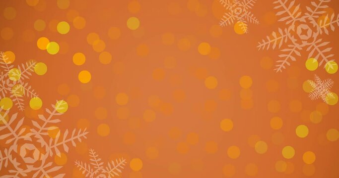 Animation of christmas snowflakes and glowing spots on orange background