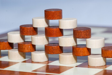 checkers are a pyramid on a chessboard