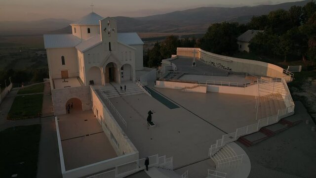 Catholic Church of the Croatian Martyrs Croatia, Udbina, Croatia Modern new Church of the Croatian Martyrs The cornerstone was blessed by the Pope John Paul II. Statue of Pope John Paul II in front 
