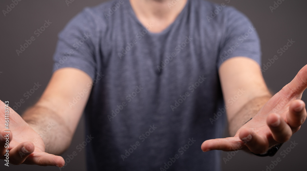 Poster man showing his empty hand.