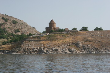 The Cathedral of the Holy Cross  on Aghtamar Island, in Lake Van in eastern Turkey, is a medieval Armenian Apostolic cathedral, built as a palatine church for the kings of Vaspurakan and later servin