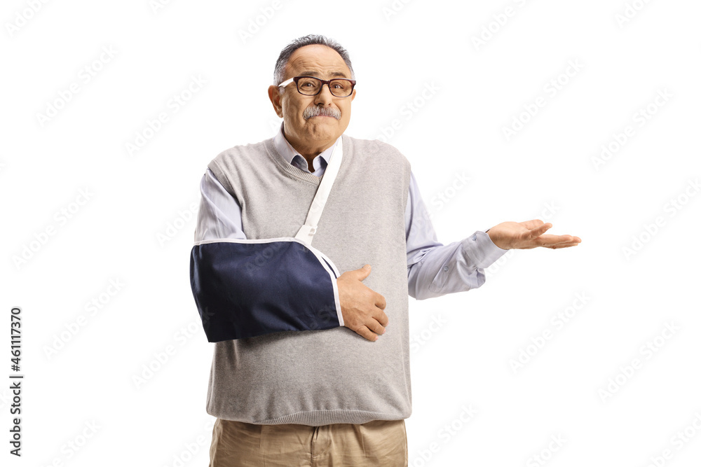 Canvas Prints Confused mature man with a broken arm wearing a splint