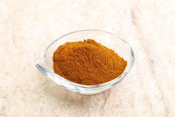 Dry Paprika powder in the bowl