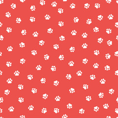 Red seamless pattern with white paws.