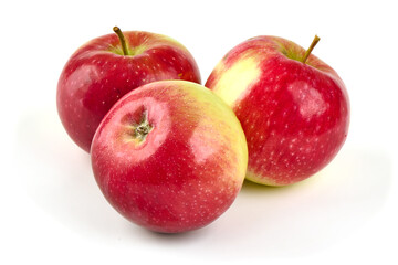 Naklejka na ściany i meble Fresh red apples, isolated on white background.