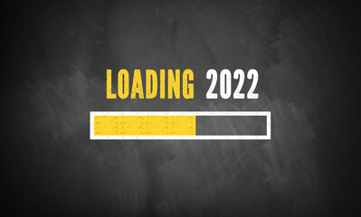 blackboard with message LOADING 2022 and a loading bar drawing