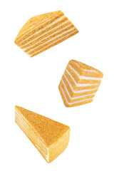 Honey cake with cream cheese filling on a white isolated background