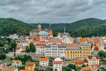 Panoramic view of famous medieval town of Loket,Elbogen, with colorful houses and stone castle above river,Czech Republic.Historical city centre is national monument.Travel architecture background