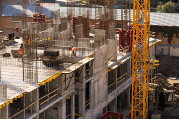 Construction site with cranes, residential complex