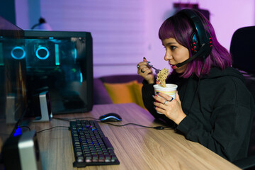 Female gamer enjoying a fantasy series © AntonioDiaz