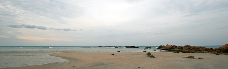 Fototapeta na wymiar Nilaveli beach under overcast sky in Trincomalee Sri Lanka Asia