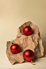 Composition of Red Christmas balls on beige background