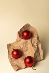 Composition of Red Christmas balls on beige background