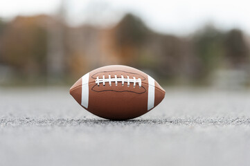 New American football ball on new urban court. Horizontal sport poster, greeting cards, headers,...