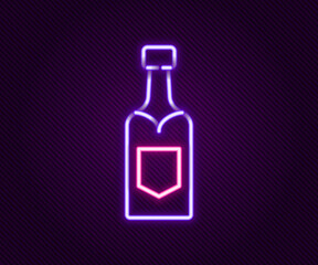 Glowing neon line Champagne bottle icon isolated on black background. Colorful outline concept. Vector