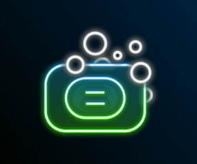 Glowing neon line Bar of soap icon isolated on black background. Soap bar with bubbles. Colorful outline concept. Vector
