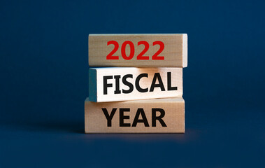 2022 fiscal new year symbol. Concept words '2022 fiscal year' on wooden blocks. Beautiful grey background. Copy space. Business and 2022 new fiscal year concept.