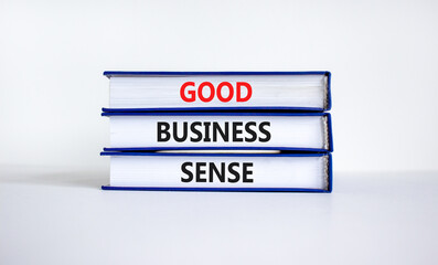 Good business sense symbol. Concept words 'Good business sense' on books. Beautiful white background. Copy space. Business and good business sense concept.