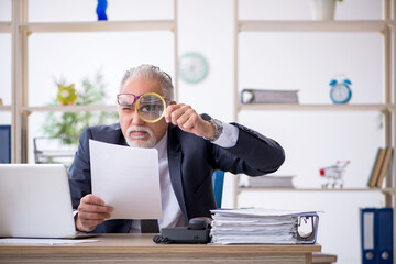 Old male employee and too much work in the office