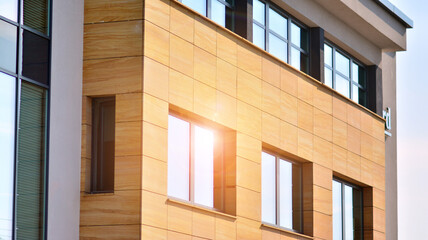 Corporate architecture building. New modern office building. Sunlight.