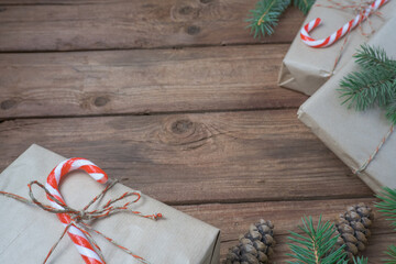 Christmas decoration and gift boxes on wooden background. Space for text