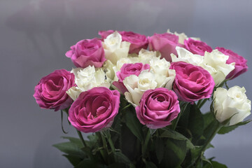 Close-up of bouquet of white and pink roses