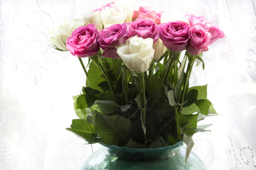 Close-up of bouquet of white and pink roses