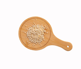 Chenopodium quinoa - White organic quinoa seeds on the wooden board