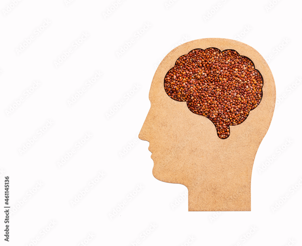 Wall mural Chenopodium quinoa - Red organic quinoa seeds in the brain shaped bowl