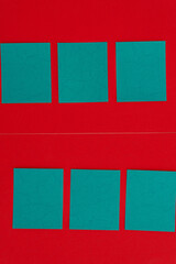green squares on red paper