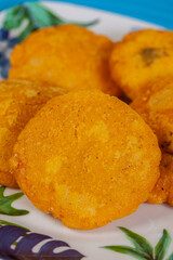 Preparation of the traditional dish from the Caribbean Coast in colombia called Arepa de Huevo or egg arepa