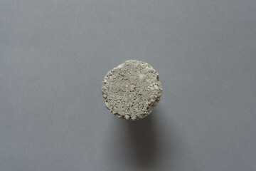 concrete object on gray paper
