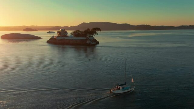 Aerial: The Brothers Lighthouse in the San Francisco Bay, Oakland, California, USA