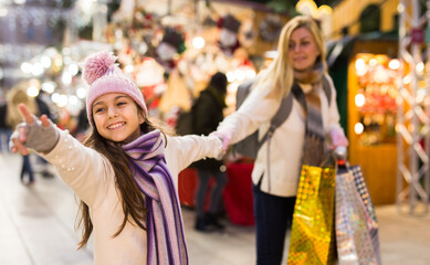 Daughter asks mom to buy Christmas present at the market