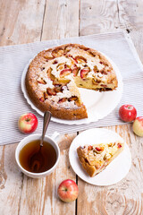Homemade Apple pie. Delicious Breakfast with Charlotte and tea.