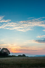 Summer sunrise and glowing clouds,Wilton,Wiltshire,England,United Kingdom.