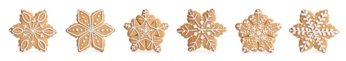 Set with tasty decorated Christmas cookies on white background. Banner design