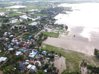 Flooding in rural communities in Thailand caused by storms causing heavy rains to continue