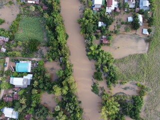 Flooding in rural communities in Thailand caused by storms causing heavy rains to continue