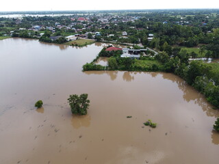 Flooding in rural communities in Thailand caused by storms causing heavy rains to continue