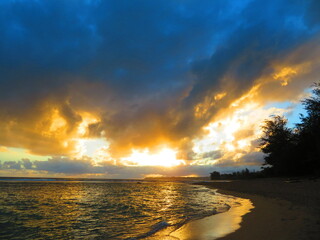 Beautiful sunset in Hawaii by ocean
