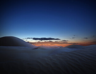 Fototapeta na wymiar Scenic view of sandy desert at sunset