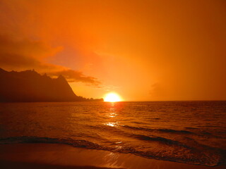 Beautiful sunset in Hawaii by ocean