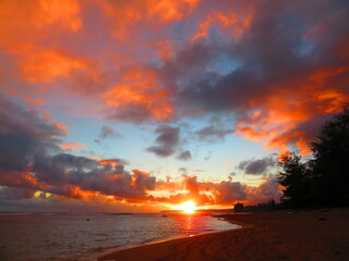 Beautiful sunset in Hawaii by ocean